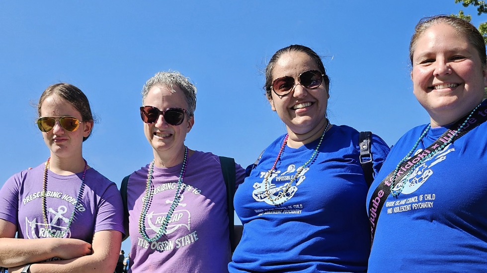 a couple of other teams pose at the Community Walk